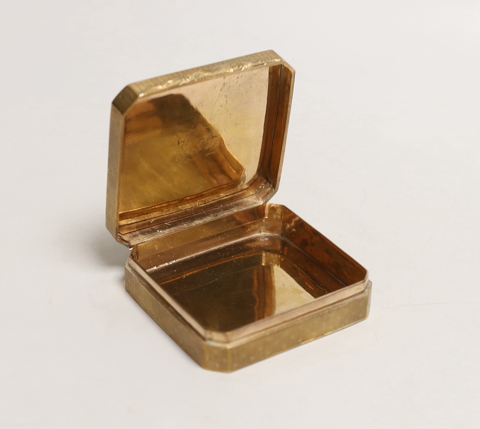 A late 19th century French gilt metal and enamel box, 8.5cm wide